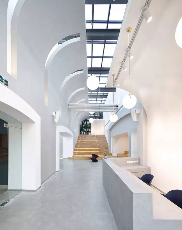 廢舊工廠改造辦公室前臺裝修設計效果圖