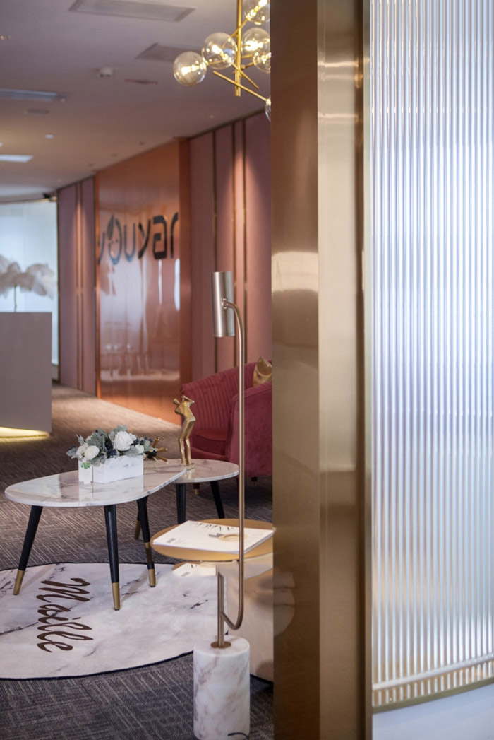 化妝品公司辦公室過渡區裝修設計效果圖