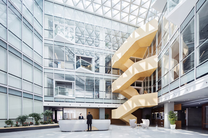 集團(tuán)總部辦公樓前臺裝修設(shè)計(jì)效果圖